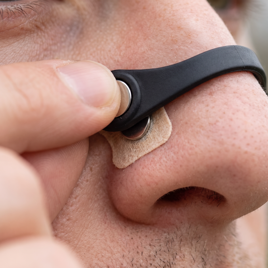 Press here. Breathe in. If that felt different, your nose isn't blocked — it's collapsing.